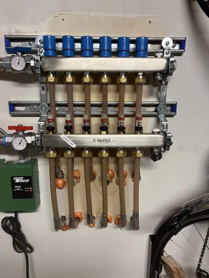 Plumber performing Water Heater Repair at a residential property in North Braddock